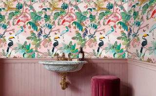tropical animal wallpaper featuring tigers and toucans among lush foliage in elegant powder room with marble sink