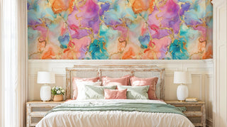 abstract watercolor wallpaper with gold veining in serene bedroom with rattan headboard