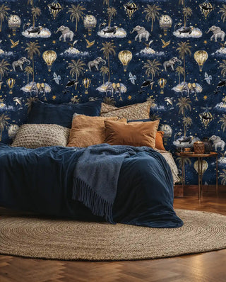 Adventure-themed wallpaper featuring elephants and hot air balloons on navy background in bedroom
