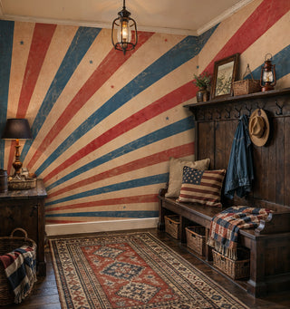 Aged Americana sunburst wall mural with red blue rays and stars in a rustic entryway with wooden coat rack