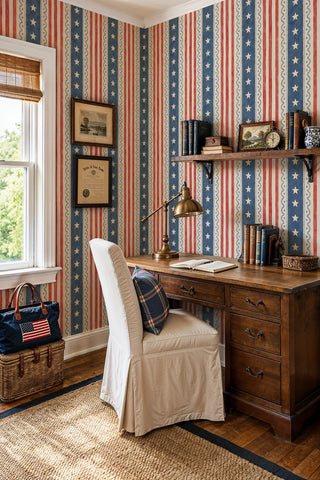 Americana stars and stripes wallpaper in a home office with wooden desk and brass lamp
