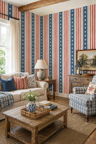 Americana stars and stripes wallpaper in blue red and cream in a farmhouse living room with gingham armchair