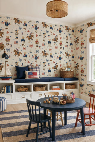 Americana teddy bear wallpaper with polo horses and gingham bows, in a playroom with navy bench seat
