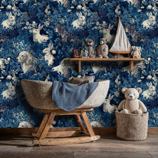 Animal themed wallpaper with rabbits and ravens in blue botanicals, shown in playroom with wooden rocking horse