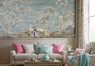 Asian birds and blossoms wall mural in cottage living room with pink and teal throw pillows