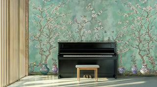 Asian blossom wall mural with delicate pink flowers and decorative vessels, showcased behind black piano in bright room