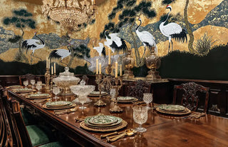 Asian crane wall mural featuring elegant birds among pines, shown in formal dining room with crystal table setting