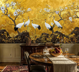 Asian crane wall mural on golden background, in a rustic dining room with fruit bowl and wine glasses
