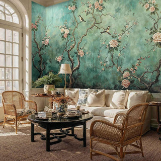 Asian garden Wall Mural with songbirds and pink peonies on sage background, shown in living room with rattan chairs