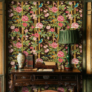 Asian-inspired wallpaper with colorful birds and blooming peonies, displayed in a traditional study with desk