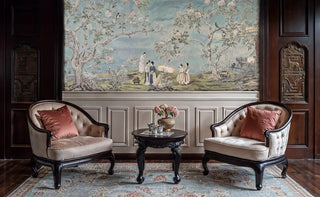 Asian landscape wall mural featuring cherry trees in minimalist bedroom with natural textures