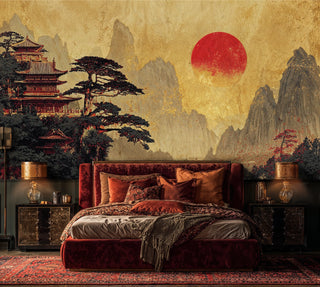 Asian landscape wallpaper with temple and red sun, styled in luxurious bedroom with burgundy velvet headboard