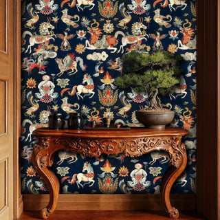 Asian mythical creatures wallpaper featuring ornate dragons and birds, displayed in entryway with carved wooden console