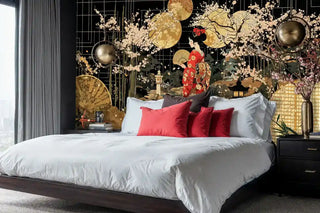 Asian themed wall mural with sakura blossoms displayed behind modern bed with red accent pillows