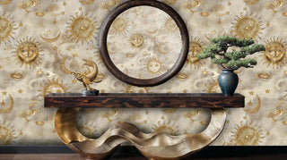 Astronomical wallpaper with golden sun moon star motifs displayed in sophisticated space with curved console table