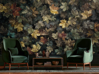 Autumn forest leaves wallpaper with golden maple leaves and rich textures in modern living room with green chairs