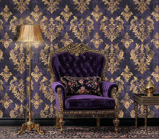 Baroque damask wallpaper featuring ornate gold patterns, shown in luxury sitting room with tufted purple chair