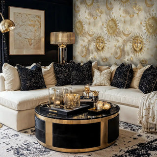 Beige and gold celestial wallpaper featuring ornate suns and crescents in modern living room with black accent wall