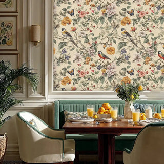 Birds and botanical wallpaper with colorful flowers shown in sophisticated dining nook with banquette seating