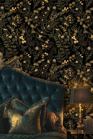 Black and gold botanical wallpaper with fern fronds and berries, in an opulent bedroom with tufted headboard