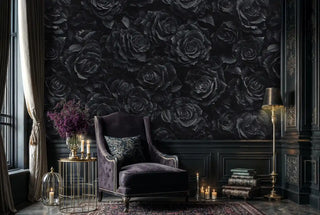 Black rose wallpaper featuring detailed monochromatic blooms in dramatic gothic style, shown in elegant reading room