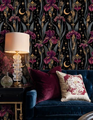 Botanical celestial wallpaper with iris motifs styled in modern living room with crystal table lamp