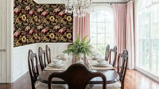 Botanical flamingo wallpaper featuring tropical birds and lush foliage, displayed in formal dining room with crystal chandelier