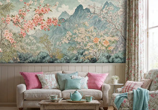 Botanical mountain wallpaper featuring pink blossoms and mountains in cottage living room with wainscoting