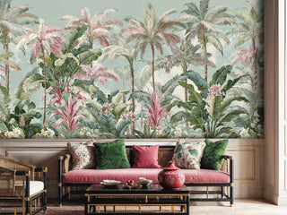 Botanical paradise wall mural featuring palm trees and tropical plants in living room with coral velvet sofa