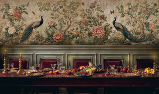 Botanical peacock wallpaper featuring detailed birds and coral peonies, shown in formal dining room with ornate table