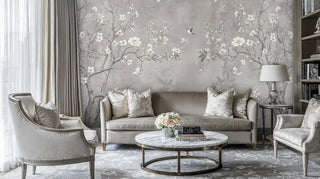 Botanical wall mural featuring cherry blossoms and flying hummingbirds in soft greys, displayed in elegant living room