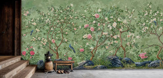 Botanical wall mural featuring flowering branches and stone rocks, displayed in rustic entryway with wooden bench
