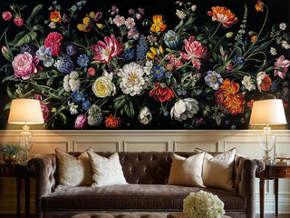 Botanical wall mural featuring vibrant flowers and green foliage in elegant living room with brown leather sofa