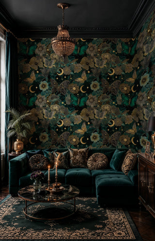 Celestial butterfly wallpaper with gold moons and teal florals in a dark glam living room with crystal chandelier