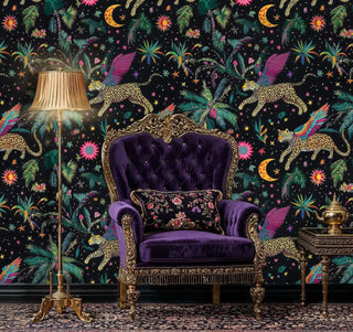 Celestial leopard wallpaper with colorful wings and moon motifs in elegant room with purple tufted chair