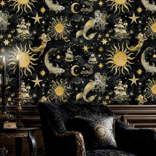 Celestial maritime wall mural with golden suns, mermaids, and ships on black background in elegant living room