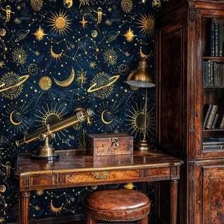Celestial navy wallpaper with star patterns featured in classic home office with wooden desk and brass lamp