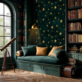 Celestial wallpaper with golden stars on emerald green, shown in elegant library with built-in bookshelves