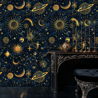 Celestial wallpaper with golden suns, moons and constellations on navy, styled in elegant room with ornate console