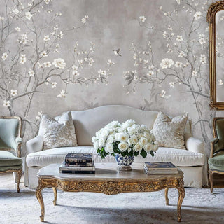 Cherry blossom hummingbird wallpaper in soft greys and whites, displayed in traditional living room with ornate coffee table