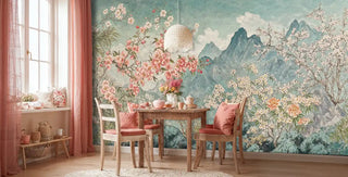 Cherry blossom mountain wall mural with pink flowers and sage peaks in dining room with wooden table and coral chairs