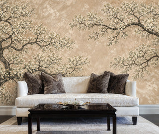 Cherry blossom wall mural with ivory blooms on beige textured background, in elegant living room with white sofa