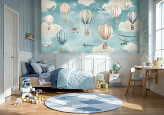 Children's aviation wallpaper with colorful hot air balloons and teddy bear pilots shown in a modern kids room with wooden desk and astronaut toy