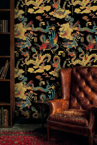 Chinese dragon wallpaper featuring imperial motifs, shown in refined study with leather chair and books