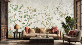 Chinoiserie garden wall mural with birds and flowering branches in beige and green, shown in living room