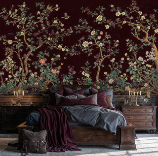 Chinoiserie garden wall mural with golden branches and pink peonies on burgundy background in rustic bedroom