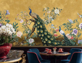 Chinoiserie peacock wall mural in gold displayed in formal dining room with navy velvet chairs