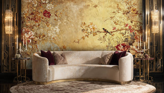 Chinoiserie peony and bird mural, gold and red, with a curved sofa and crystal sconces