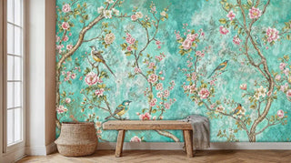 Chinoiserie style wallpaper with birds and blossoms shown in entryway with rustic wooden bench and wicker basket