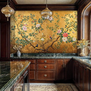 Chinoiserie wall mural with birds and blooms on gold background in luxury kitchen with marble counters